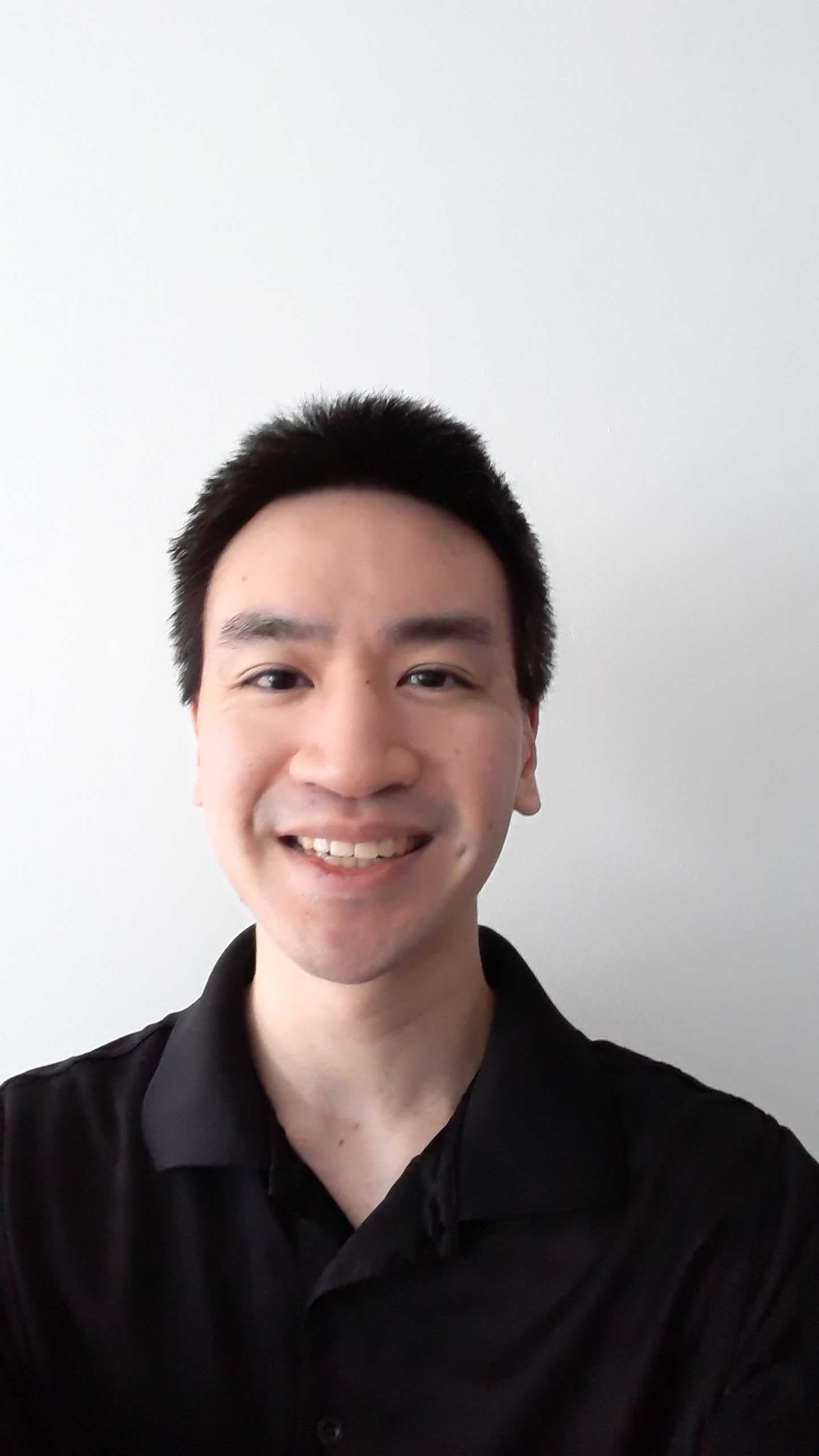 Headshot in front of a white background of Full Stack Developer, Colin Lum