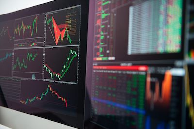 Stock exchange data dashboard on 2 screens